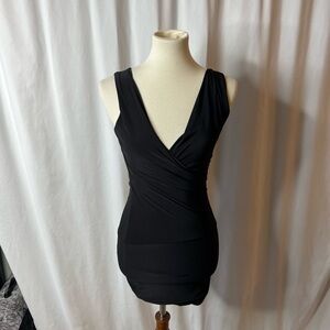 ⸻

White House Black Market Black Surplice Ruched Dress | Size M | Silk Blend